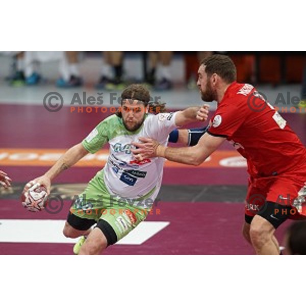 Dean Bombac of Slovenia in action at Preliminary Group A match Slovenia-Belarus at Qatar 2015 World Handball championships in Lusail Sport Arena, Doha on January 17, 2015