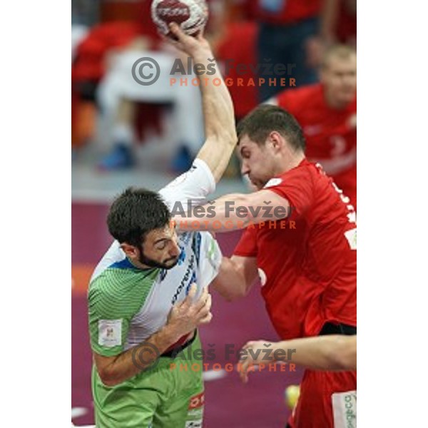 Dragan Gajic in action at Preliminary Group A match Slovenia-Belarus at Qatar 2015 World Handball championships in Lusail Sport Arena, Doha on January 17, 2015