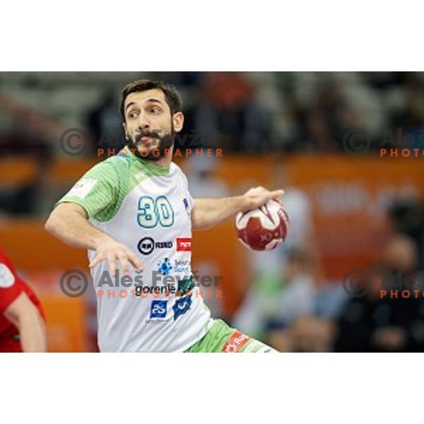 Dragan Gajic of Slovenia in action at Preliminary Group A match Slovenia-Belarus at Qatar 2015 World Handball championships in Lusail Sport Arena, Doha on January 17, 2015