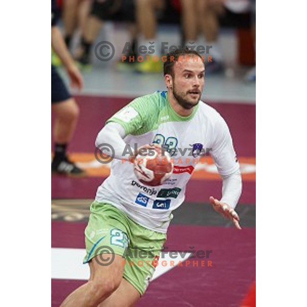 Uros Zorman of Slovenia in action at Preliminary Group A match Slovenia-Belarus at Qatar 2015 World Handball championships in Lusail Sport Arena, Doha on January 17, 2015