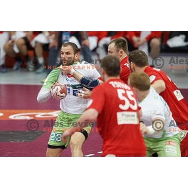 Uros Zorman of Slovenia in action at Preliminary Group A match Slovenia-Belarus at Qatar 2015 World Handball championships in Lusail Sport Arena, Doha on January 17, 2015