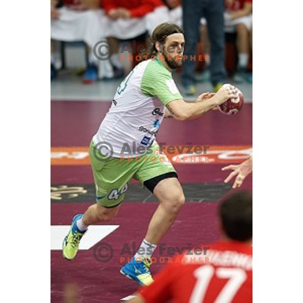 Dean Bombac of Slovenia in action at Preliminary Group A match Slovenia-Belarus at Qatar 2015 World Handball championships in Lusail Sport Arena, Doha on January 17, 2015