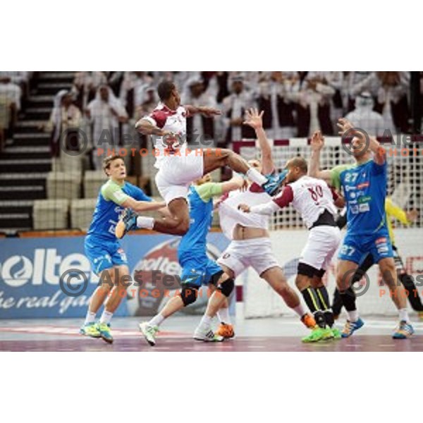 action at Preliminary Group A match Slovenia-Qatar at Qatar 2015 World Handball championships in Lusail Sport Arena, Doha on January 19, 2015