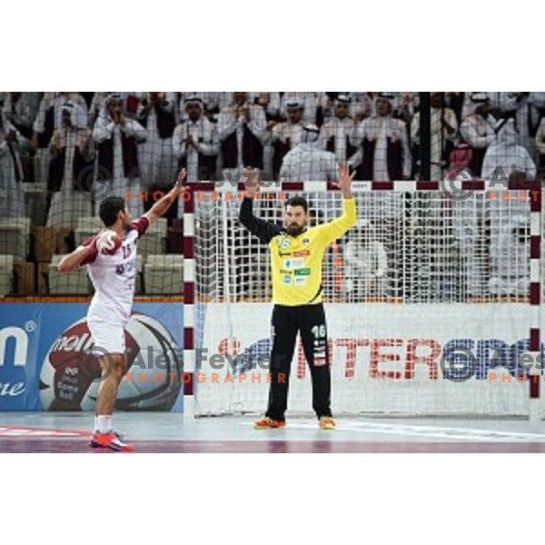 action at Preliminary Group A match Slovenia-Qatar at Qatar 2015 World Handball championships in Lusail Sport Arena, Doha on January 19, 2015