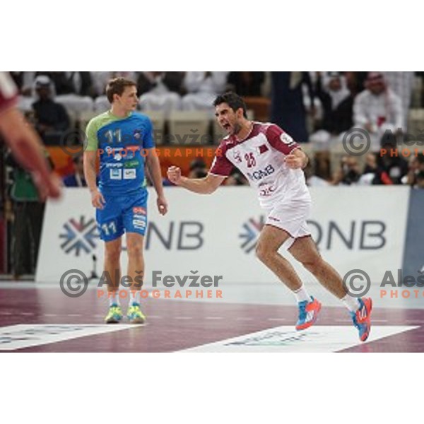 action at Preliminary Group A match Slovenia-Qatar at Qatar 2015 World Handball championships in Lusail Sport Arena, Doha on January 19, 2015