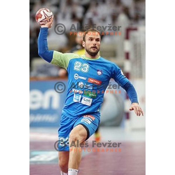 Uros Zorman of Slovenia in action at Preliminary Group A match Slovenia-Qatar at Qatar 2015 World Handball championships in Lusail Sport Arena, Doha on January 19, 2015