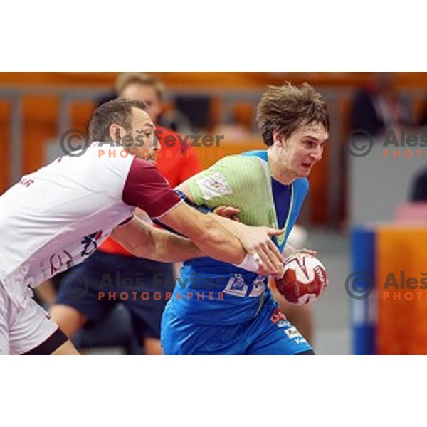 Sebastjan Skube of Slovenia in action at Preliminary Group A match Slovenia-Qatar at Qatar 2015 World Handball championships in Lusail Sport Arena, Doha on January 19, 2015