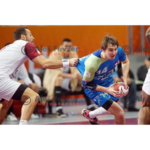 Sebastjan Skube of Slovenia in action at Preliminary Group A match Slovenia-Qatar at Qatar 2015 World Handball championships in Lusail Sport Arena, Doha on January 19, 2015