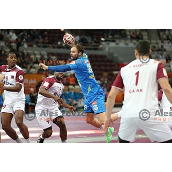 Uros Zorman of Slovenia in action at Preliminary Group A match Slovenia-Qatar at Qatar 2015 World Handball championships in Lusail Sport Arena, Doha on January 19, 2015