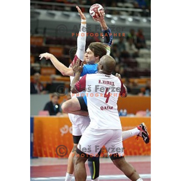 action at Preliminary Group A match Slovenia-Qatar at Qatar 2015 World Handball championships in Lusail Sport Arena, Doha on January 19, 2015