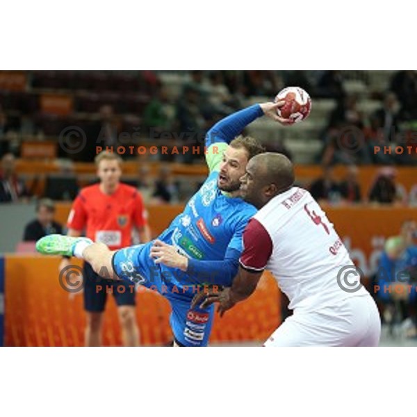 Uros Zorman of Slovenia in action at Preliminary Group A match Slovenia-Qatar at Qatar 2015 World Handball championships in Lusail Sport Arena, Doha on January 19, 2015