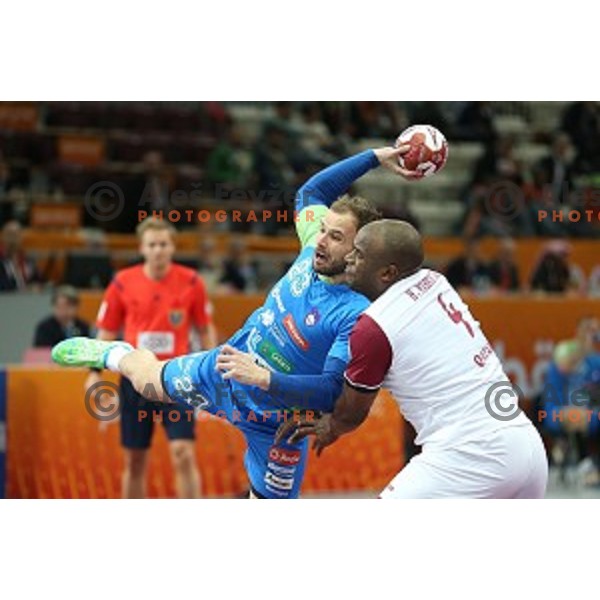 Uros Zorman of Slovenia in action at Preliminary Group A match Slovenia-Qatar at Qatar 2015 World Handball championships in Lusail Sport Arena, Doha on January 19, 2015