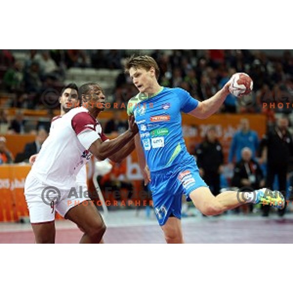 Jure Dolenec of Slovenia in action at Preliminary Group A match Slovenia-Qatar at Qatar 2015 World Handball championships in Lusail Sport Arena, Doha on January 19, 2015