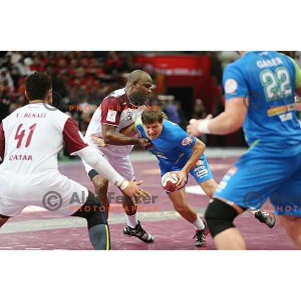 action at Preliminary Group A match Slovenia-Qatar at Qatar 2015 World Handball championships in Lusail Sport Arena, Doha on January 19, 2015