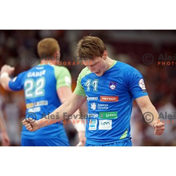 Jure Dolenec of Slovenia in action at Preliminary Group A match Slovenia-Qatar at Qatar 2015 World Handball championships in Lusail Sport Arena, Doha on January 19, 2015