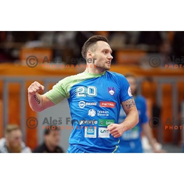 Luka Zvizej of Slovenia in action at Preliminary Group A match Slovenia-Qatar at Qatar 2015 World Handball championships in Lusail Sport Arena, Doha on January 19, 2015