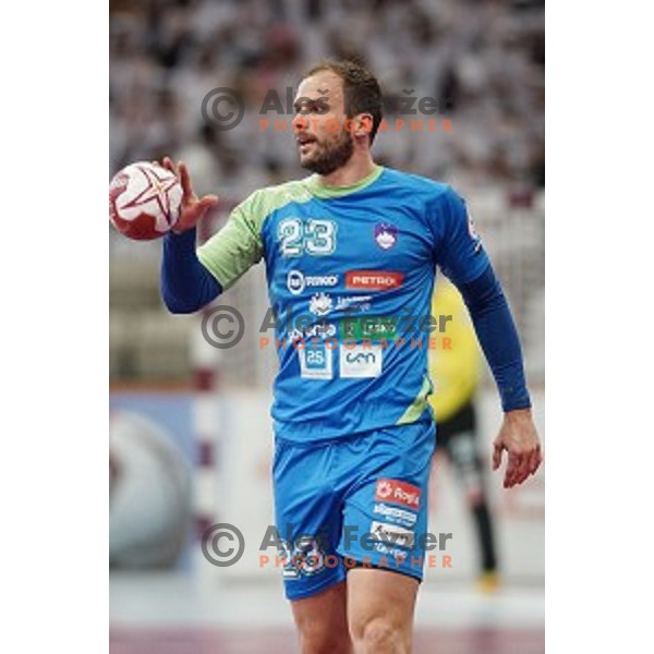 Uros Zorman of Slovenia in action at Preliminary Group A match Slovenia-Qatar at Qatar 2015 World Handball championships in Lusail Sport Arena, Doha on January 19, 2015