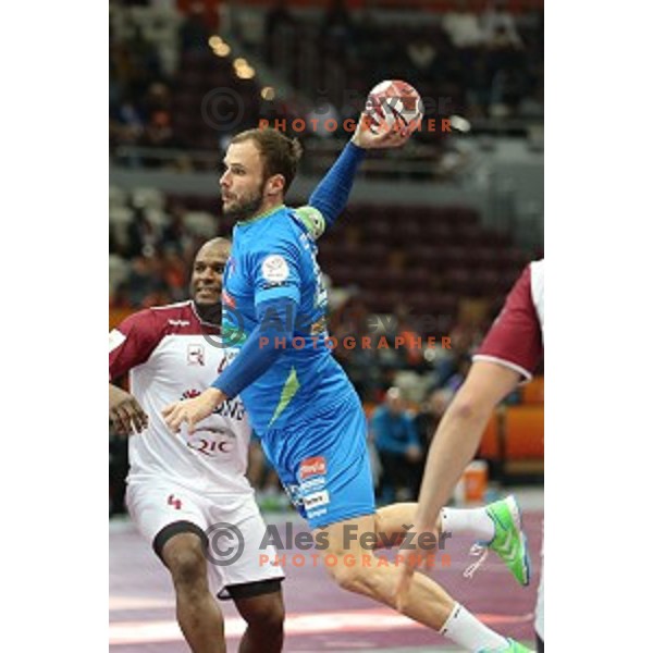 Uros Zorman of Slovenia in action at Preliminary Group A match Slovenia-Qatar at Qatar 2015 World Handball championships in Lusail Sport Arena, Doha on January 19, 2015