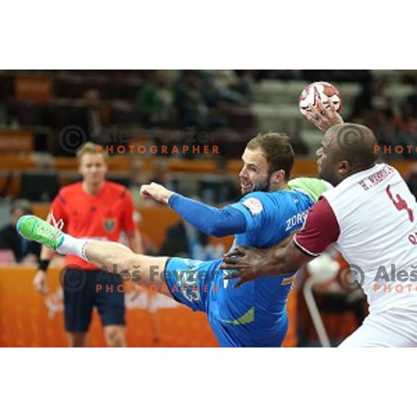 Uros Zorman of Slovenia in action at Preliminary Group A match Slovenia-Qatar at Qatar 2015 World Handball championships in Lusail Sport Arena, Doha on January 19, 2015