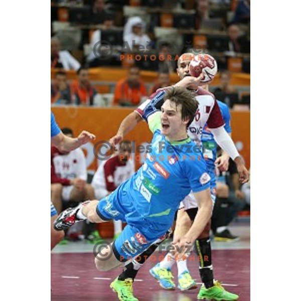 Sebastjan Skube of Slovenia in action at Preliminary Group A match Slovenia-Qatar at Qatar 2015 World Handball championships in Lusail Sport Arena, Doha on January 19, 2015