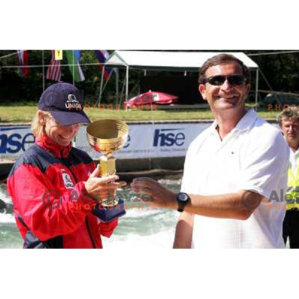 Hilgertova (left)receives trophy for third place from Slovene defense minister Karel Erjavec after Final of ICF slalom World Cup race in Tacen, Slovenia on July 8th 2007. Photo by Ales Fevzer 