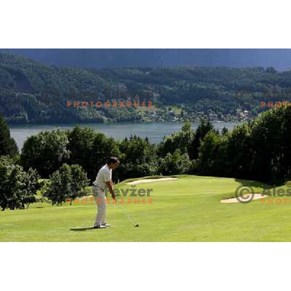 Playing 5th hole at Millstatter See golf club in Austria. Photo by Ales Fevzer 