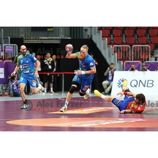 Miha Zvizej of Slovenia in action at Preliminary Group A match Slovenia-Spain at Qatar 2015 World Handball championships in Duhail Sport Arena, Doha on January 23, 2015