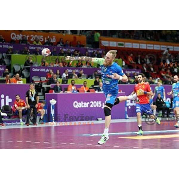 Miha Zvizej of Slovenia in action at Preliminary Group A match Slovenia-Spain at Qatar 2015 World Handball championships in Duhail Sport Arena, Doha on January 23, 2015