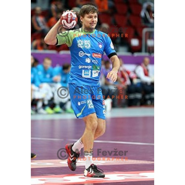 Marko Bezjak of Slovenia in action at Preliminary Group A match Slovenia-Spain at Qatar 2015 World Handball championships in Duhail Sport Arena, Doha on January 23, 2015