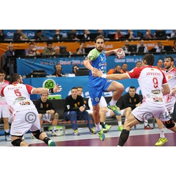 Jure Natek of Slovenia in action during eight-final match Slovenia-Macedonia at Qatar 2015 World Handball championships in Al Saad Sport Arena, Doha on January 25, 2015