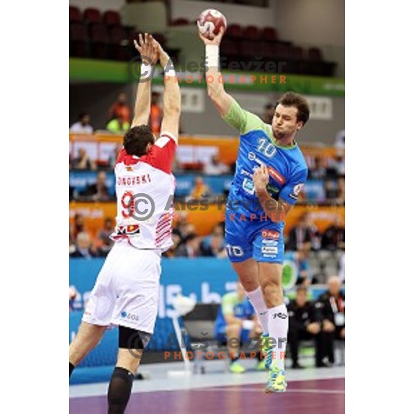 Klemen Cehte of Slovenia in action during eight-final match Slovenia-Macedonia at Qatar 2015 World Handball championships in Al Saad Sport Arena, Doha on January 25, 2015