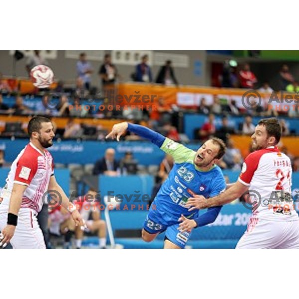 Uros Zorman of Slovenia in action during eight-final match Slovenia-Macedonia at Qatar 2015 World Handball championships in Al Saad Sport Arena, Doha on January 25, 2015