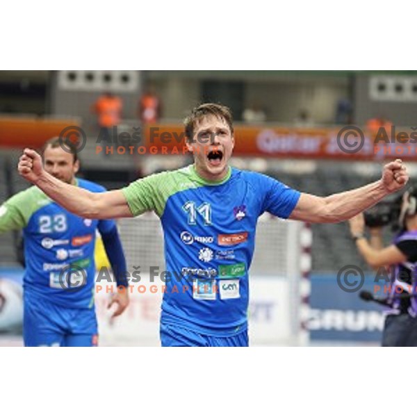 Jure Dolenec of Slovenia in action during eight-final match Slovenia-Macedonia at Qatar 2015 World Handball championships in Al Saad Sport Arena, Doha on January 25, 2015