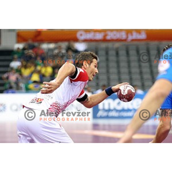 Renato Vugrinec of Macedonia in action during eight-final match Slovenia-Macedonia at Qatar 2015 World Handball championships in Al Saad Sport Arena, Doha on January 25, 2015