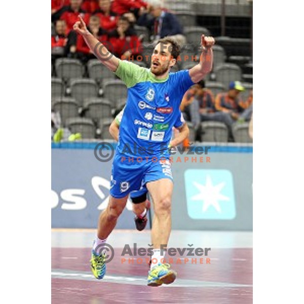 Jure Natek of Slovenia in action during eight-final match Slovenia-Macedonia at Qatar 2015 World Handball championships in Al Saad Sport Arena, Doha on January 25, 2015