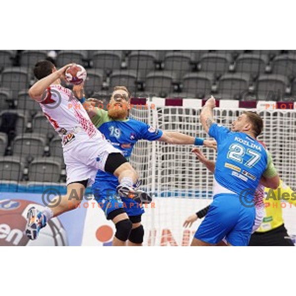 Miha Zvizej of Slovenia in action during eight-final match Slovenia-Macedonia at Qatar 2015 World Handball championships in Al Saad Sport Arena, Doha on January 25, 2015