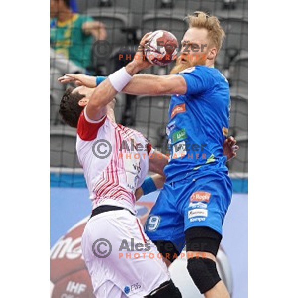 Miha Zvizej of Slovenia in action during eight-final match Slovenia-Macedonia at Qatar 2015 World Handball championships in Al Saad Sport Arena, Doha on January 25, 2015