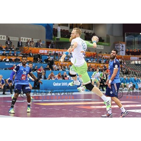 Miha Zvizej of Slovenia in action during quarter-final match Slovenia-France at Qatar 2015 World Handball championships in Al Sadd Sport Arena, Doha on January 28, 2015