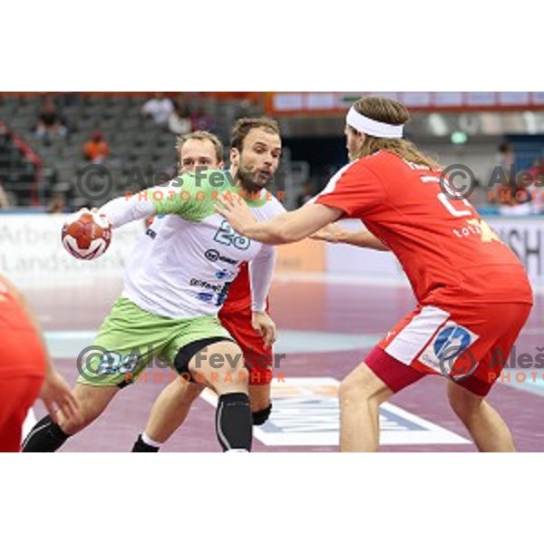 Uros Zorman of Slovenia in action during placement match 5-8 between Slovenia and Denmark at Qatar 2015 World Handball championships in Al Sadd Sport Arena, Doha on January 30, 2015