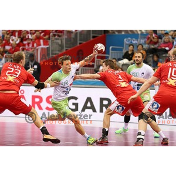 Jure Dolenec of Slovenia in action during placement match 5-8 between Slovenia and Denmark at Qatar 2015 World Handball championships in Al Sadd Sport Arena, Doha on January 30, 2015