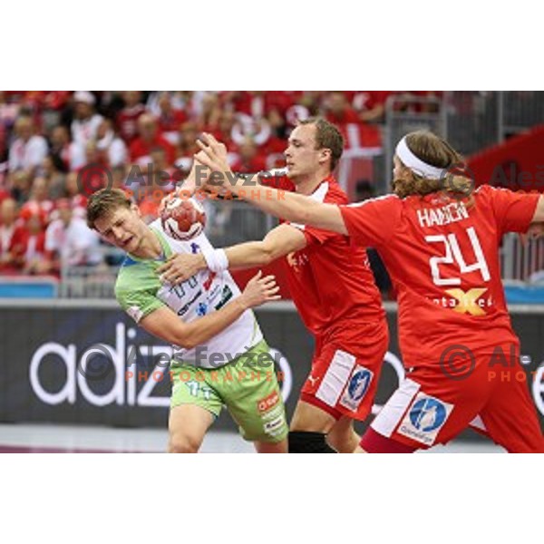 Jure Dolenec of Slovenia in action during placement match 5-8 between Slovenia and Denmark at Qatar 2015 World Handball championships in Al Sadd Sport Arena, Doha on January 30, 2015