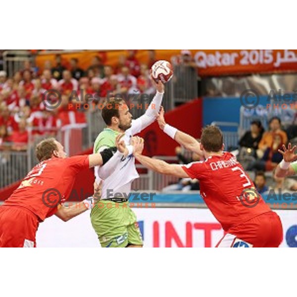 Uros Zorman of Slovenia in action during placement match 5-8 between Slovenia and Denmark at Qatar 2015 World Handball championships in Al Sadd Sport Arena, Doha on January 30, 2015