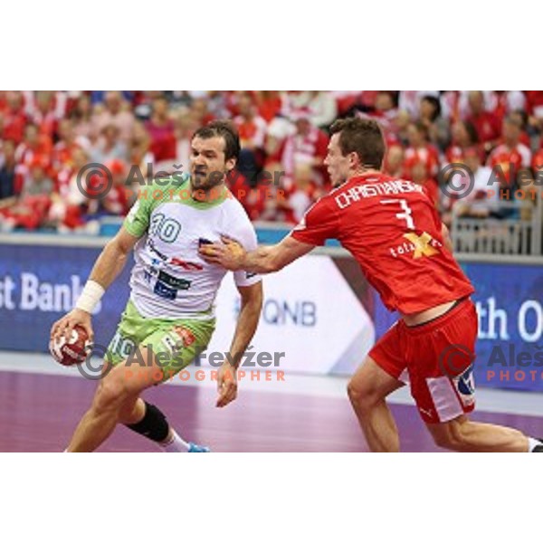 Klemen Cehte of Slovenia in action during placement match 5-8 between Slovenia and Denmark at Qatar 2015 World Handball championships in Al Sadd Sport Arena, Doha on January 30, 2015