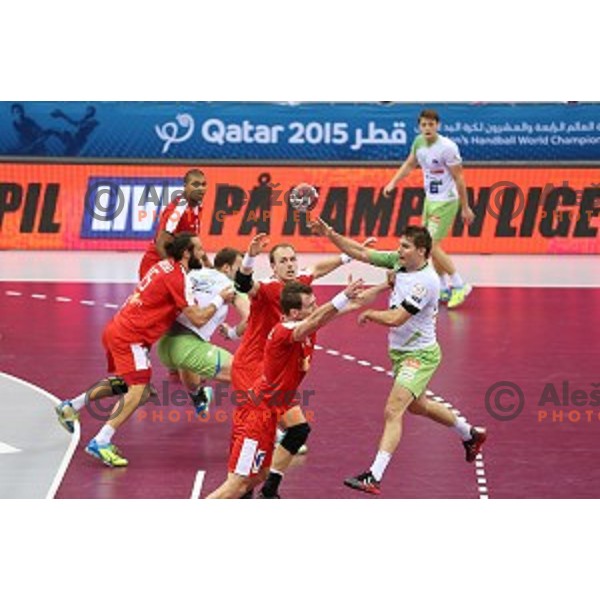 Marko Bezjak of Slovenia in action during placement match 5-8 between Slovenia and Denmark at Qatar 2015 World Handball championships in Al Sadd Sport Arena, Doha on January 30, 2015