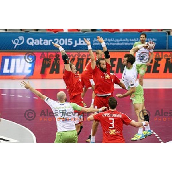 Klemen Cehte of Slovenia in action during placement match 5-8 between Slovenia and Denmark at Qatar 2015 World Handball championships in Al Sadd Sport Arena, Doha on January 30, 2015