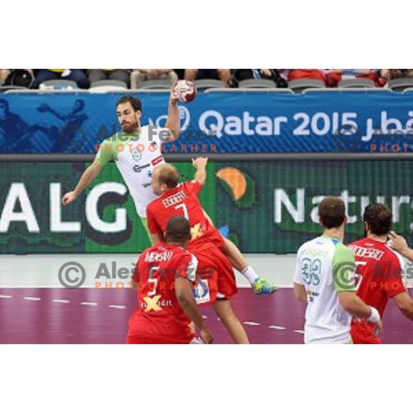 Jure Natek of Slovenia in action during placement match 5-8 between Slovenia and Denmark at Qatar 2015 World Handball championships in Al Sadd Sport Arena, Doha on January 30, 2015