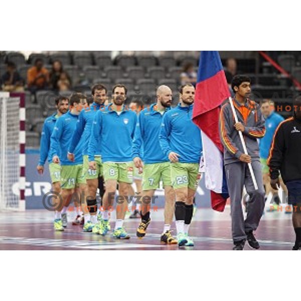 Jure Natek, Vid Kavticnik and Uros Zorman of Slovenia in action during placement match 5-8 between Slovenia and Denmark at Qatar 2015 World Handball championships in Al Sadd Sport Arena, Doha on January 30, 2015