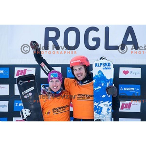 Marion Kreiner (AUT) and Zan Kosir (SLO) in action during snowboard match of FIS Snowboard WC Parallel Gaint Slalom Rogla 2015, Rogla, Slovenia, on January 31, 2015
