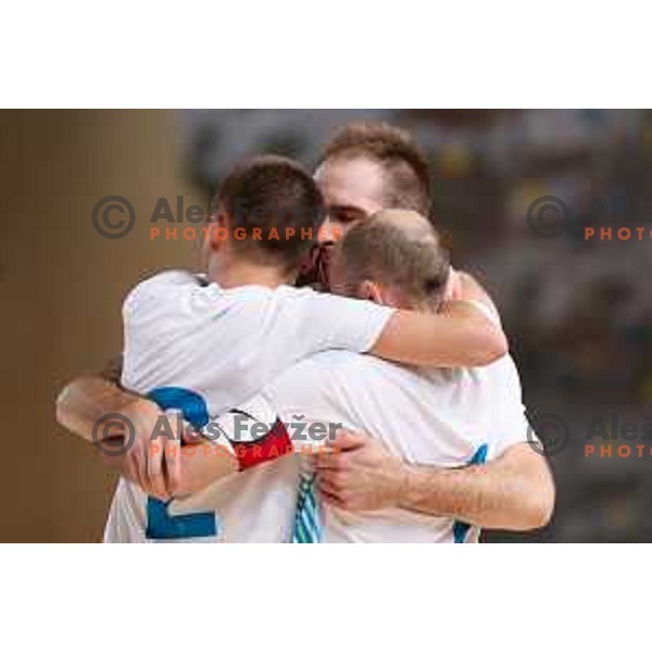 Rok Mordej, Igor Osredkar and Kristjan Cujec of Slovenia celebrating during friendly Futsal match between Slovenia and Iran, played in Kidricevo, Slovenia on February 10, 2015