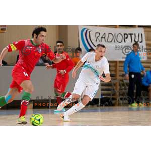 Taheri Mohammad, team captain of Iran vs Rok Mordej of Slovenia during friendly Futsal match between Slovenia and Iran, played in Kidricevo, Slovenia on February 10, 2015